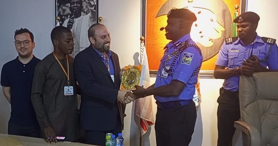 CIA Global Intelligence's CEO and Co-Founder Receiving a Plaque of Honor from the Nigeria Police